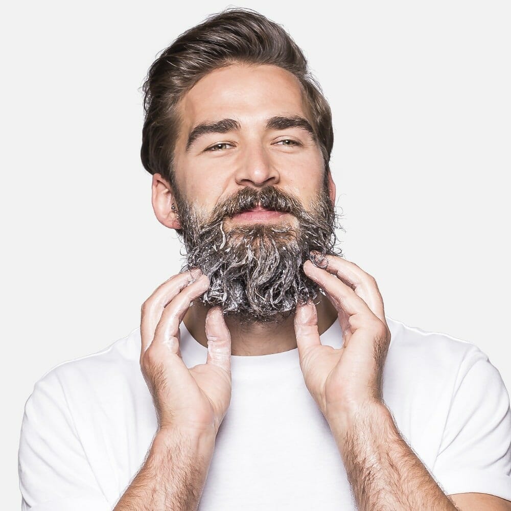 Photo of man using bard beard shampoo