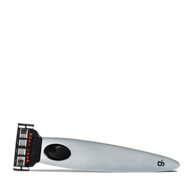 Silver razor with black button