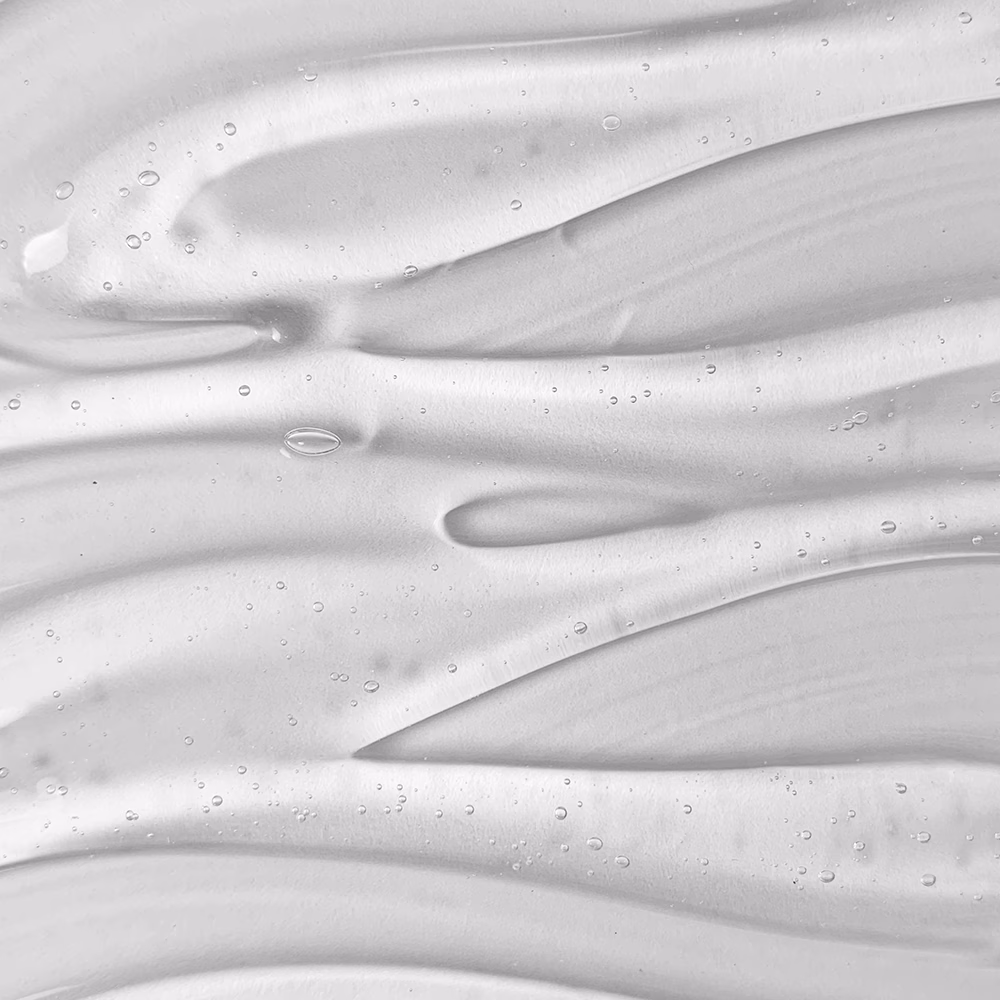 Swirled white texture with droplets.