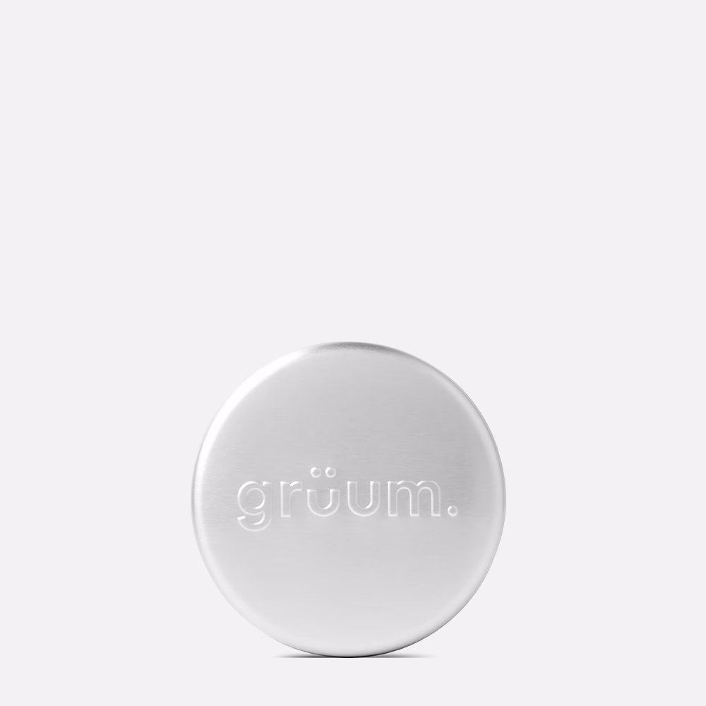 Silver tin with embossed text