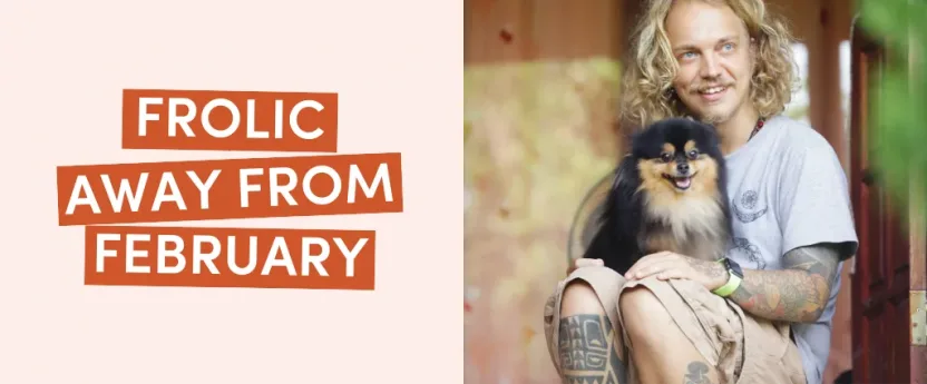 Person with dog sitting on steps