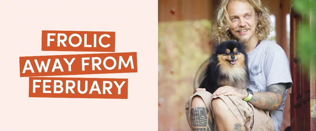 Person with dog sitting on steps