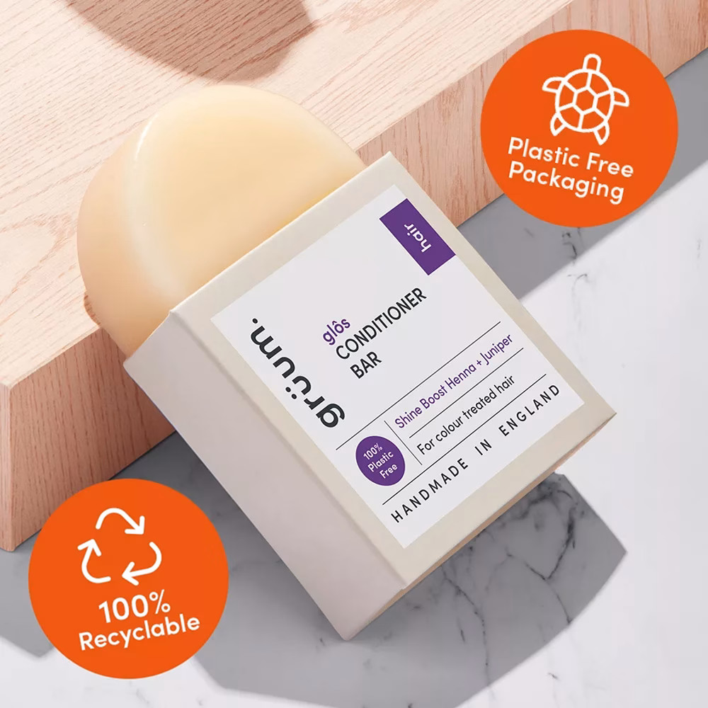 Solid conditioner bar in recyclable cardboard packaging
