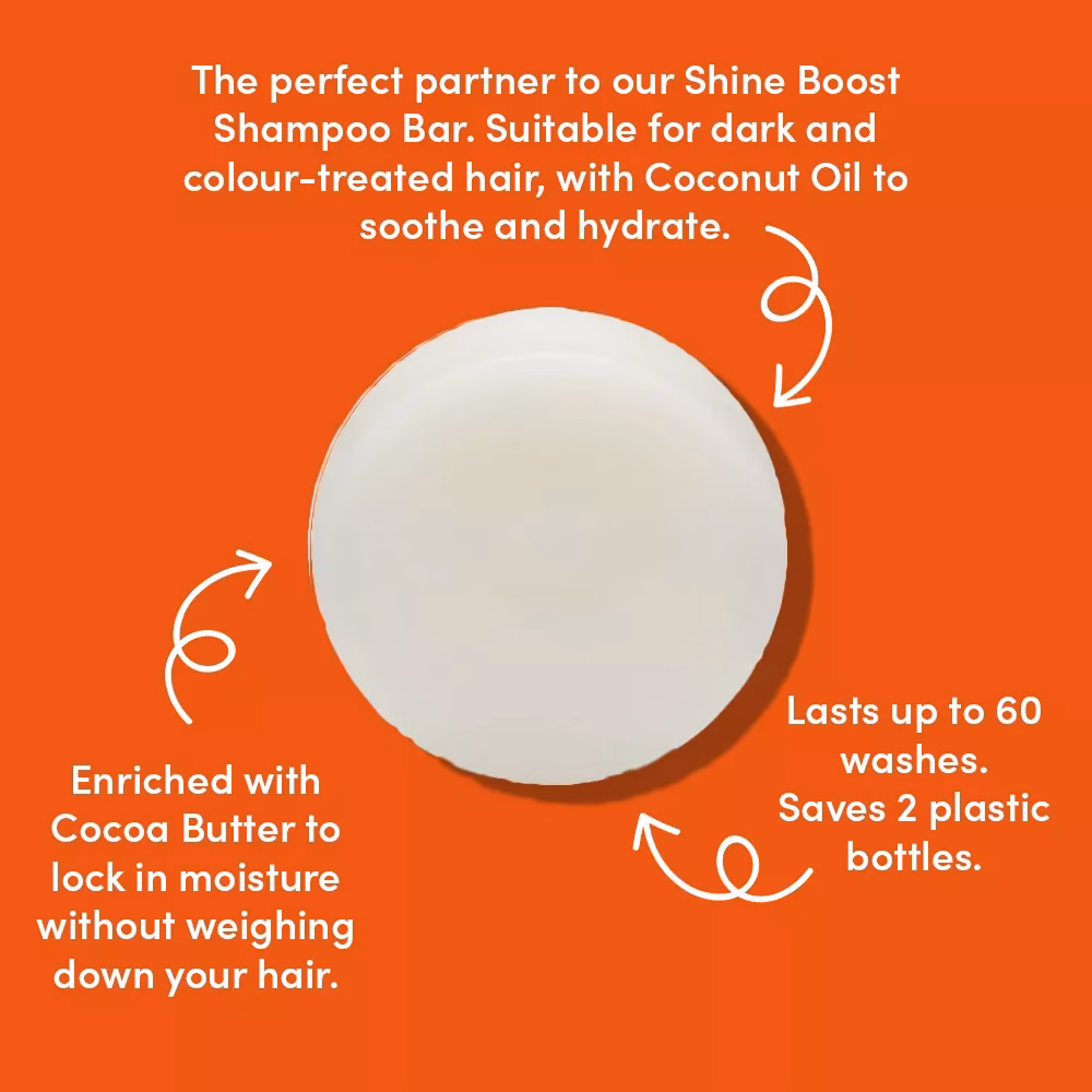 Round white conditioner bar on orange background