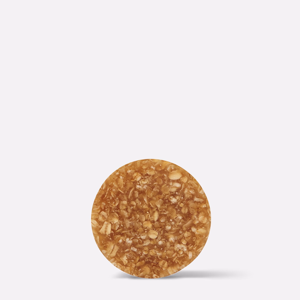 Brown circular object on white background.