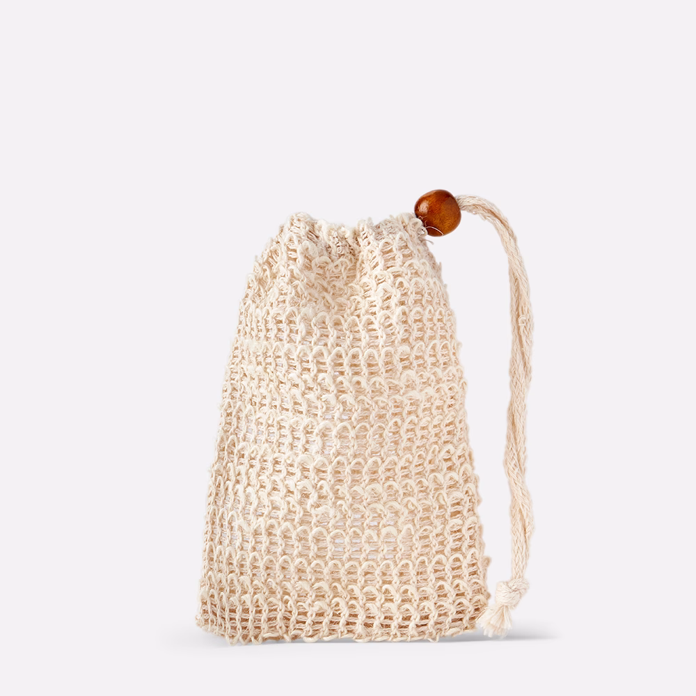 Beige mesh drawstring bag.