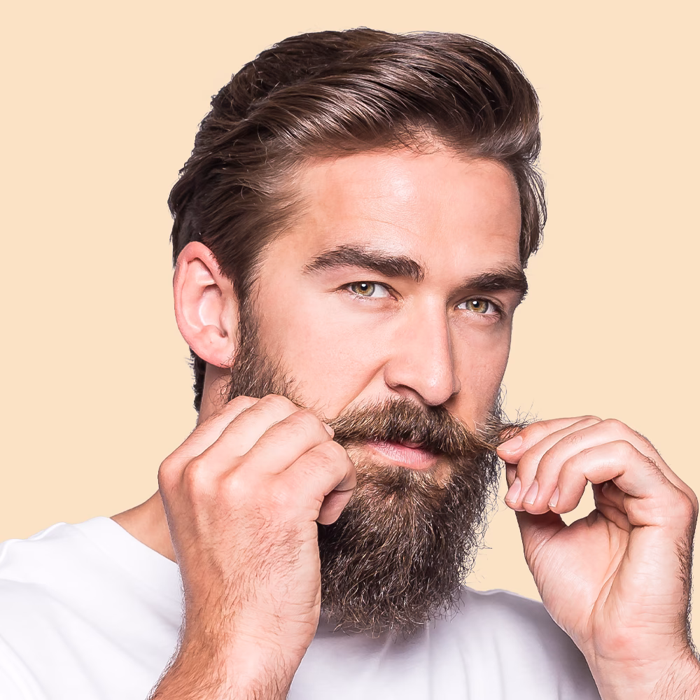 Man styling his mustache