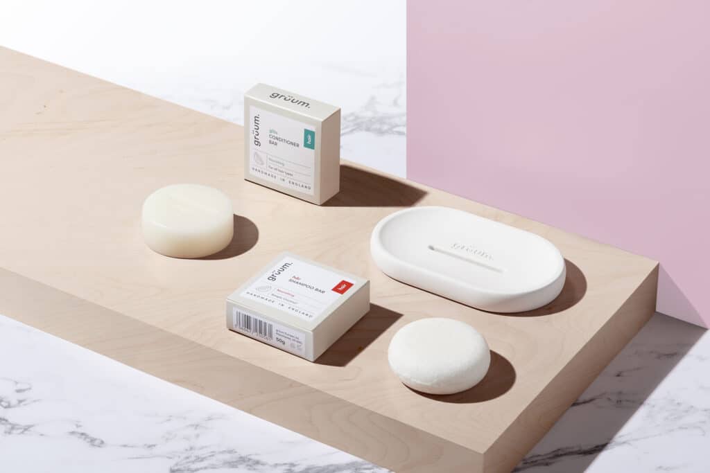 Gruum Haircare Heroes product image with shampoo bar, conditioner bar and halla soap dish