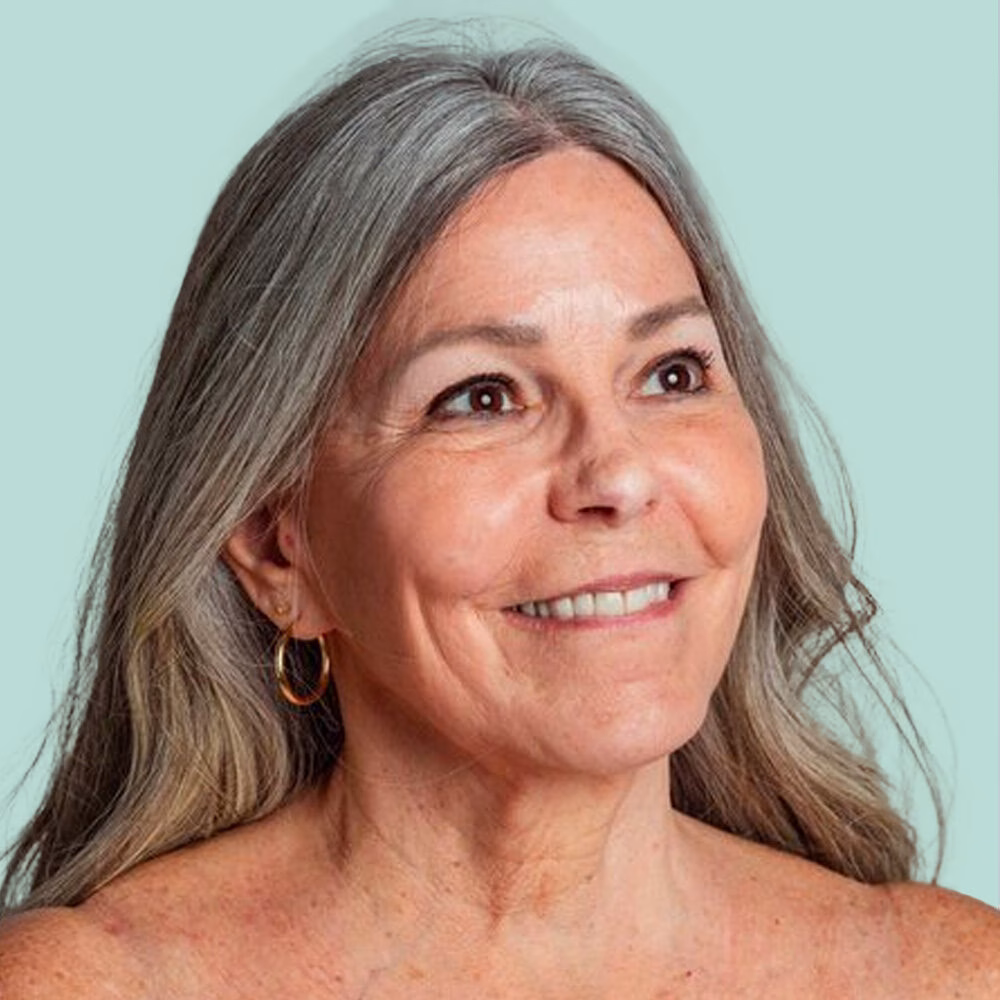 Smiling woman with gray hair