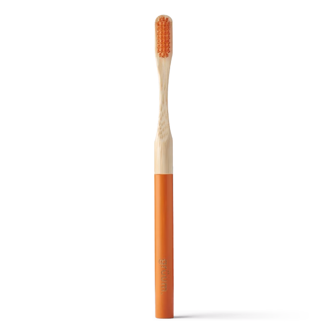 Orange and bamboo toothbrush
