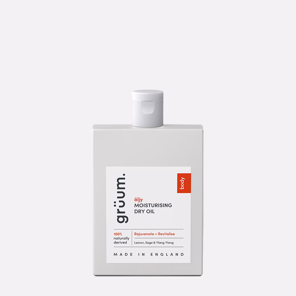 White bottle of moisturising dry oil.