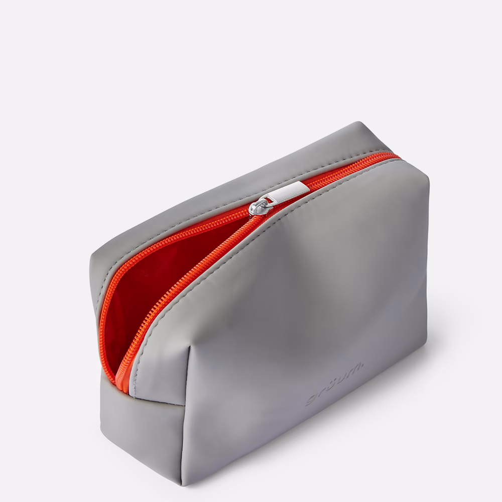 Gray pouch with orange zipper