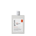 Exfoliating toner bottle on black background.