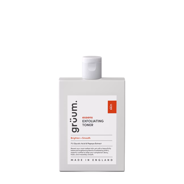 Exfoliating toner bottle on black background.