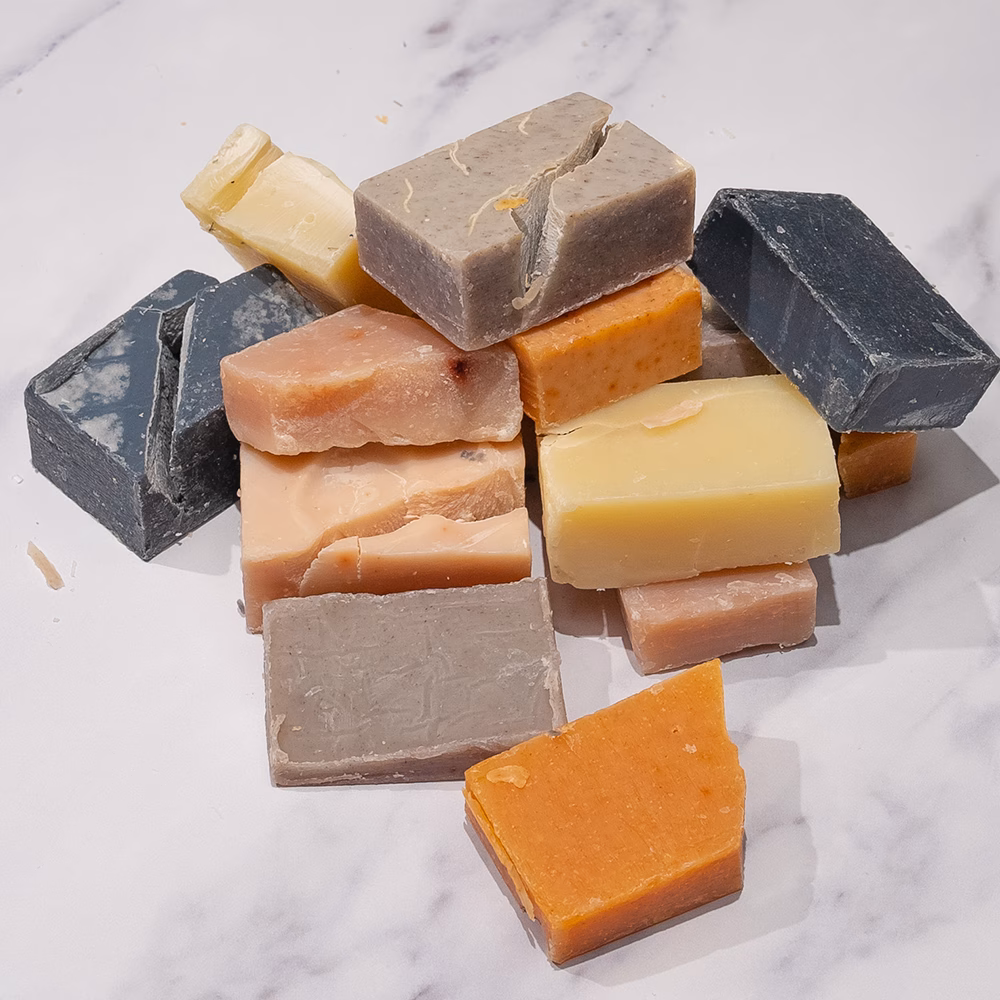 Multiple soap bars stacked together.