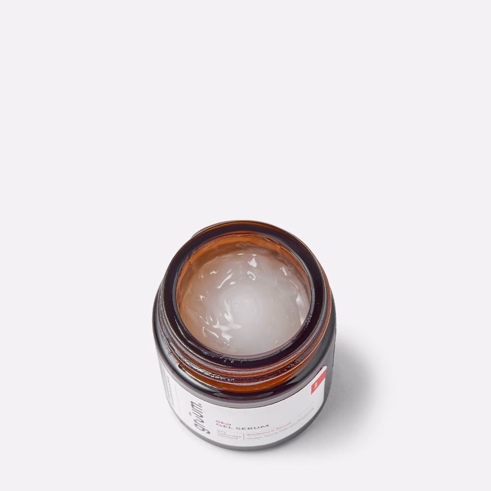 Open jar with cream inside.