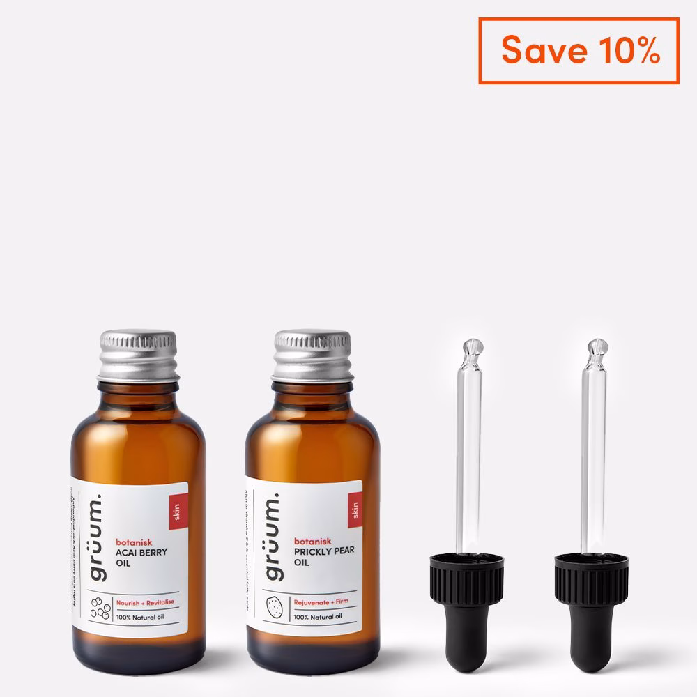 Two bottles and droppers with oils