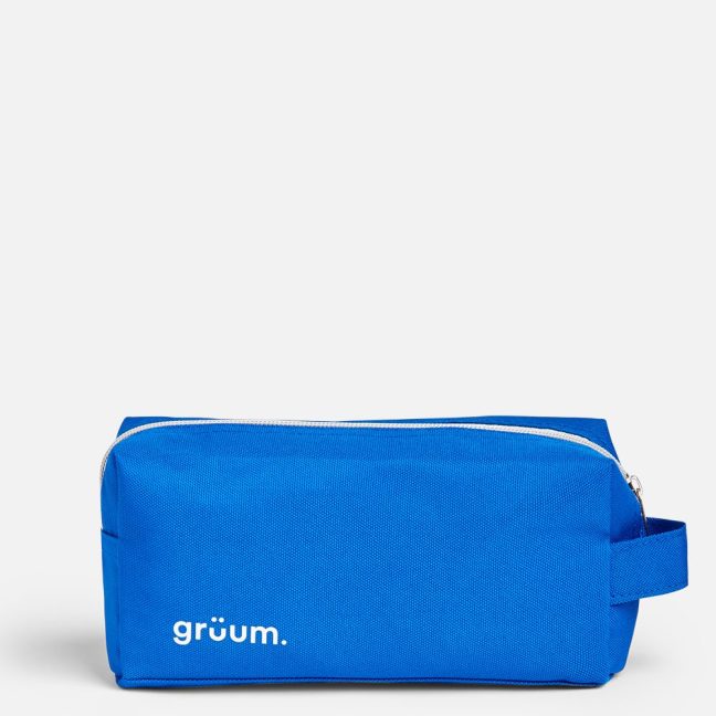 Blue toiletry bag with zipper.