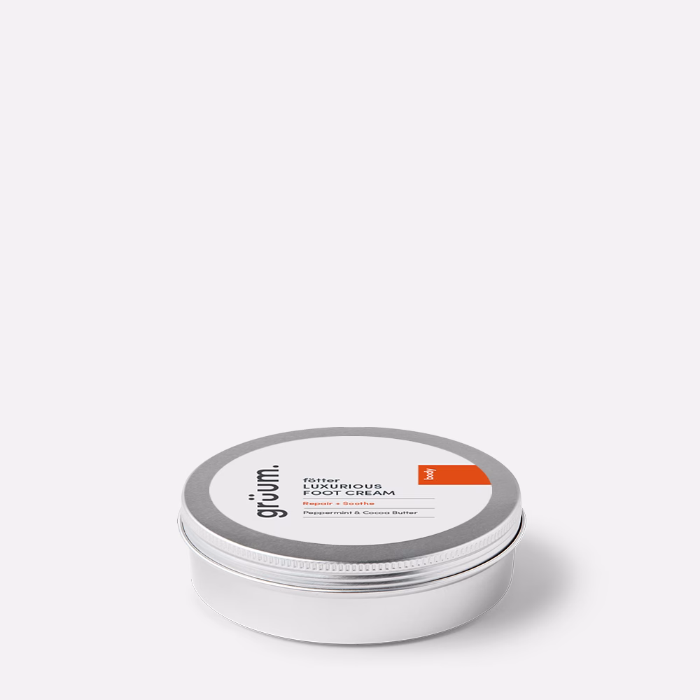 Foot cream tin on white background.