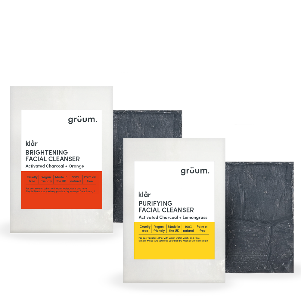 Two packages of facial cleansers.