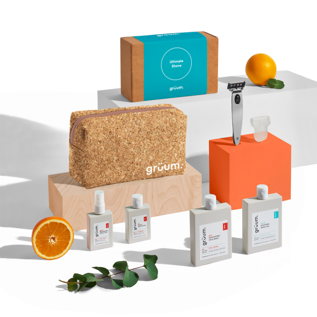 Grooming products on display with orange slices.