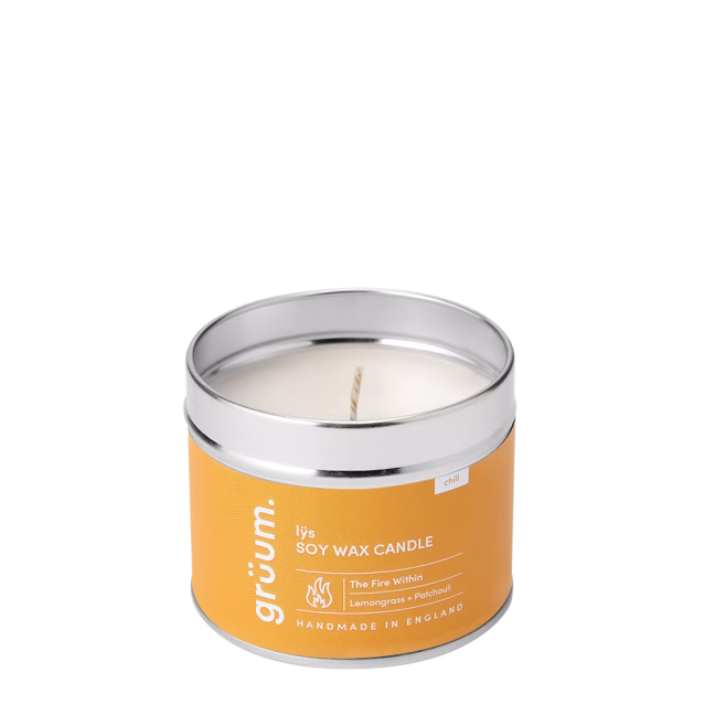 Soy wax candle in tin container.