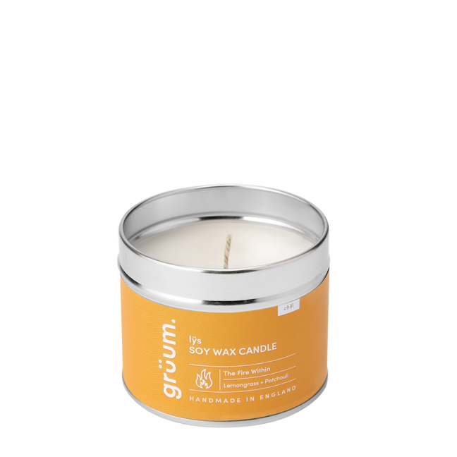 Soy wax candle in tin container.