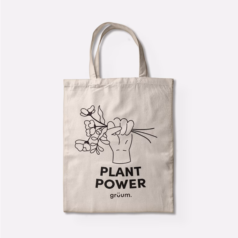 Tote bag with 'Plant Power' design.