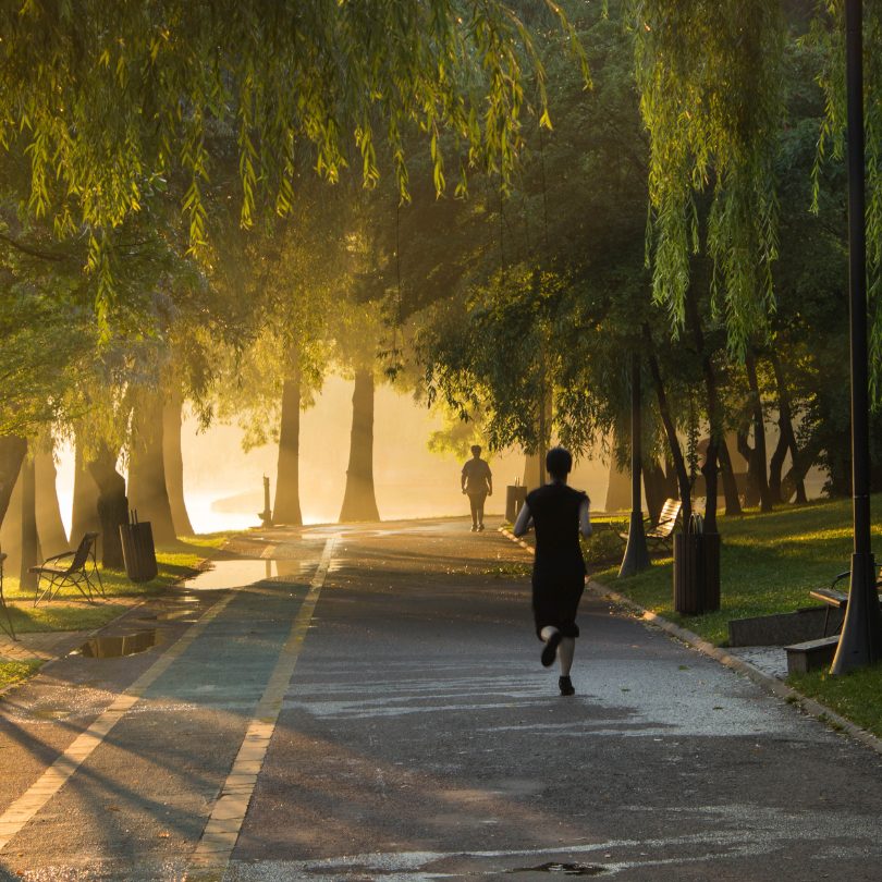 man jogging on a spring morning. The benefits of exercising.