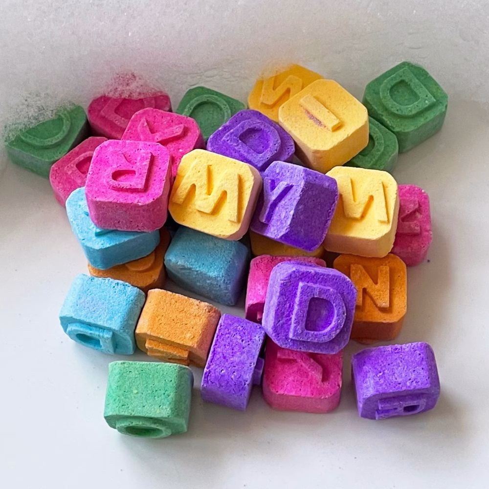 Colorful letter bath fizzies