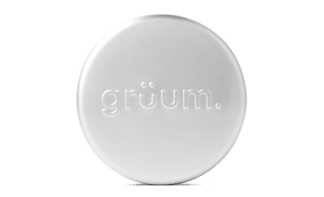 Round white object with logo.