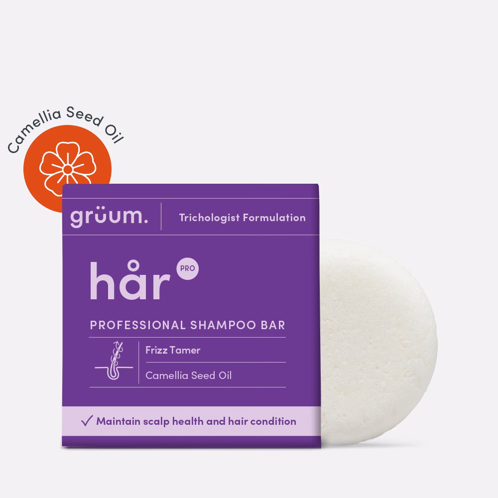 Purple shampoo bar package with white bar