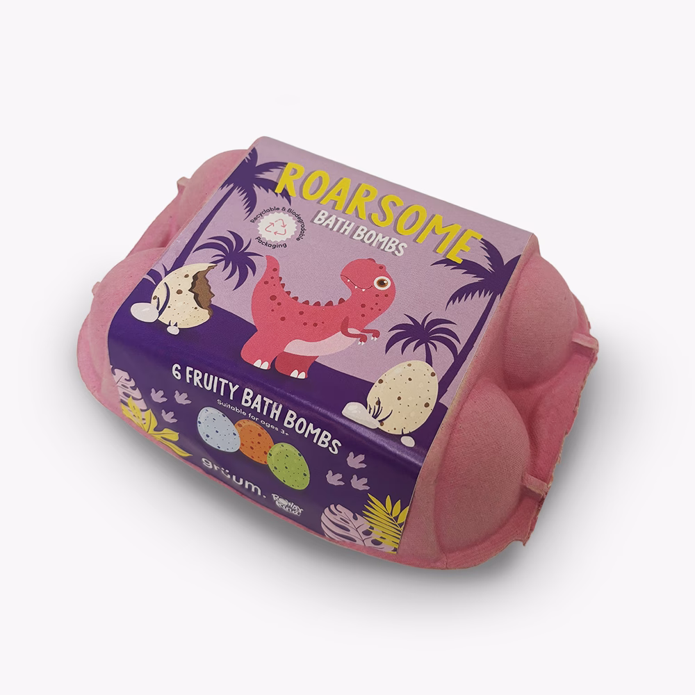 Pink box of dinosaur-themed bath bombs