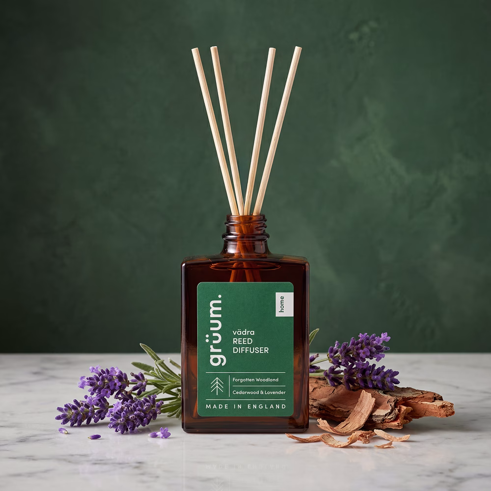 Reed diffuser with lavender and wood pieces.