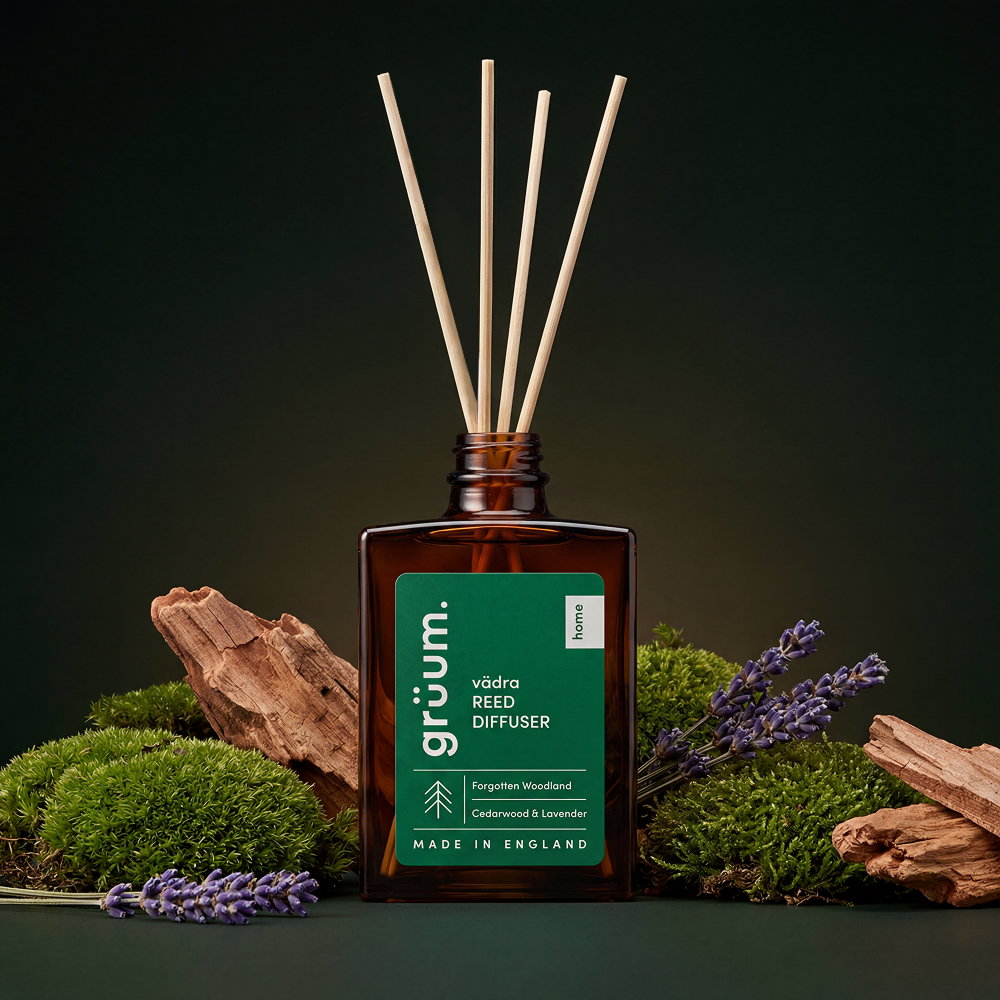 Reed diffuser with wood and lavender accents.