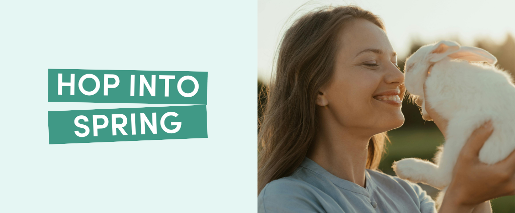 Woman holding a white rabbit