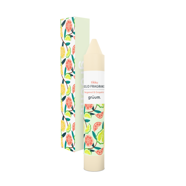 Solid fragrance stick with fruity design.