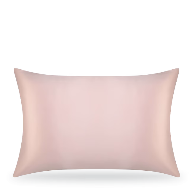 Beige pillow on white background