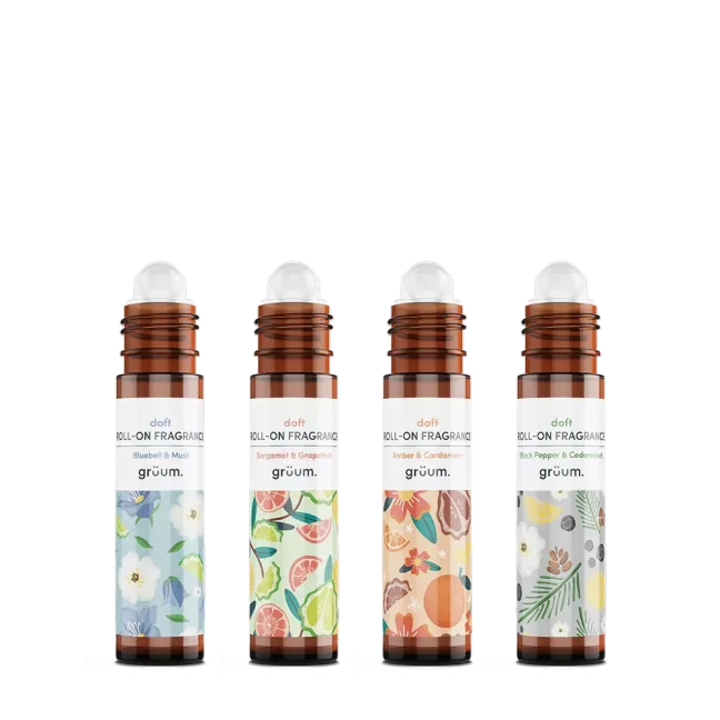 Four roll-on fragrance bottles with patterns.
