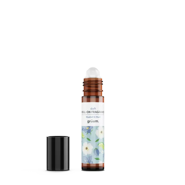 Roll-on fragrance bottle with floral design.
