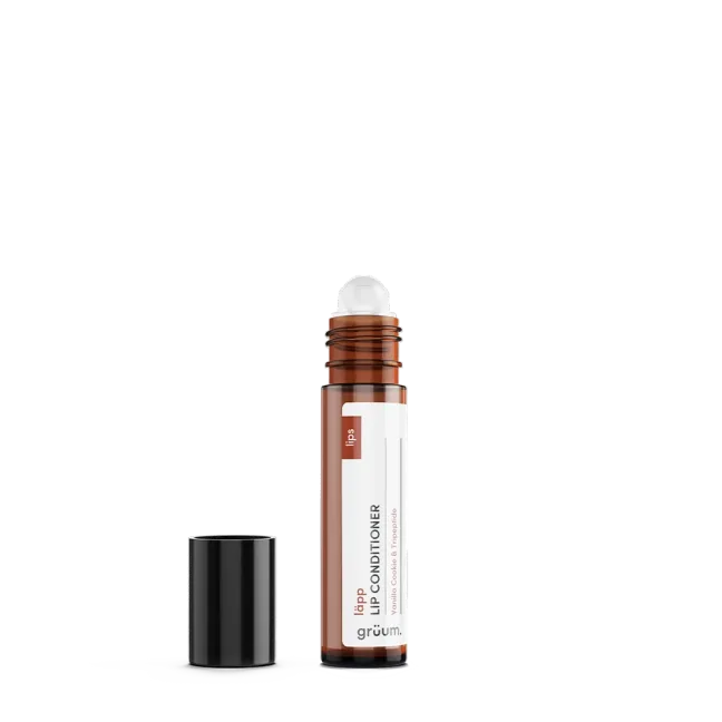Lip conditioner bottle with cap removed.