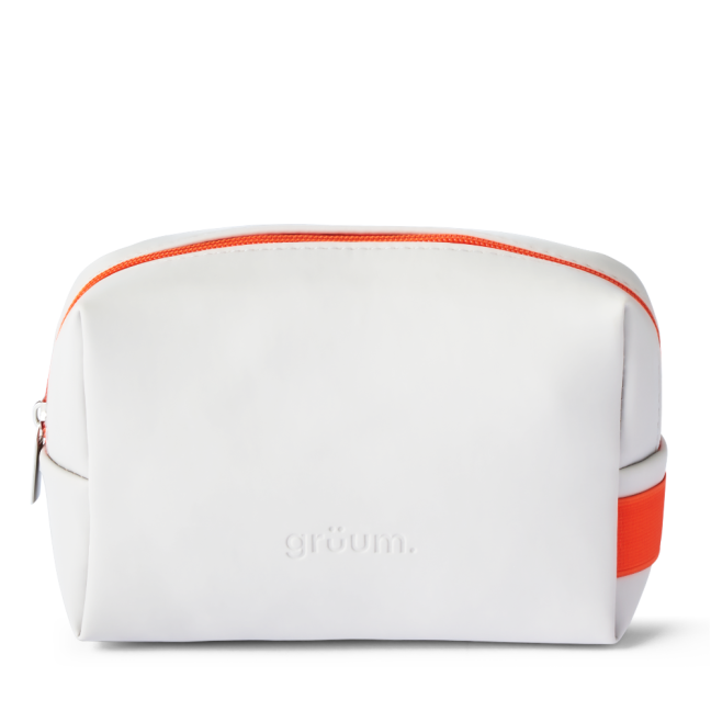 White toiletry bag with orange zipper