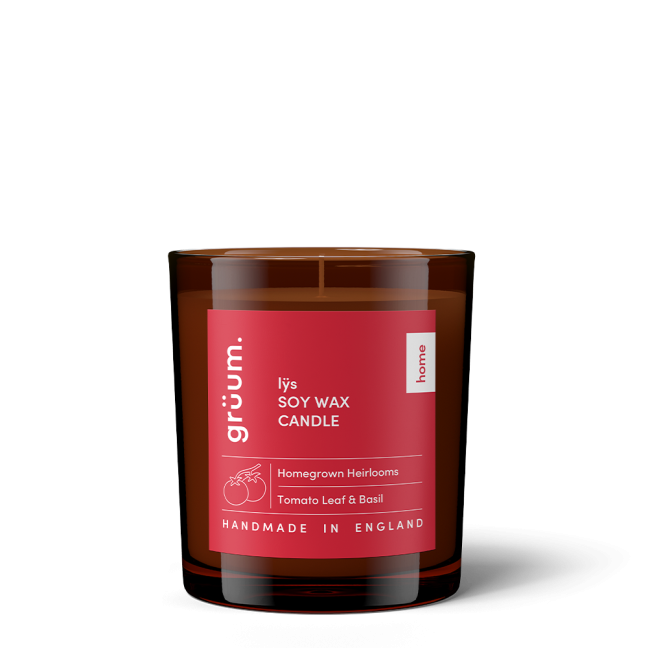 Brown wax candle in glass jar