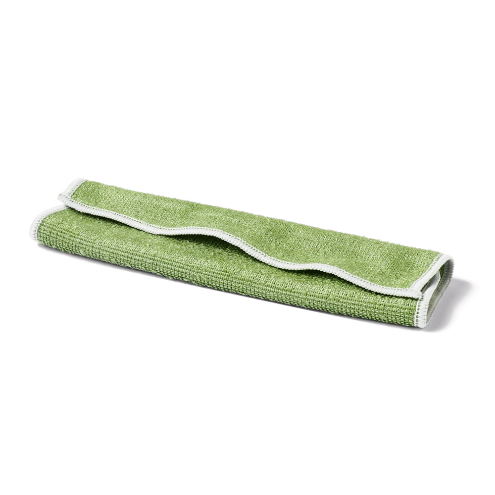 Rolled green cleaning cloth