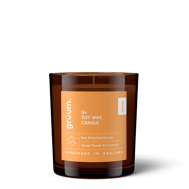 Soy wax candle in glass jar.