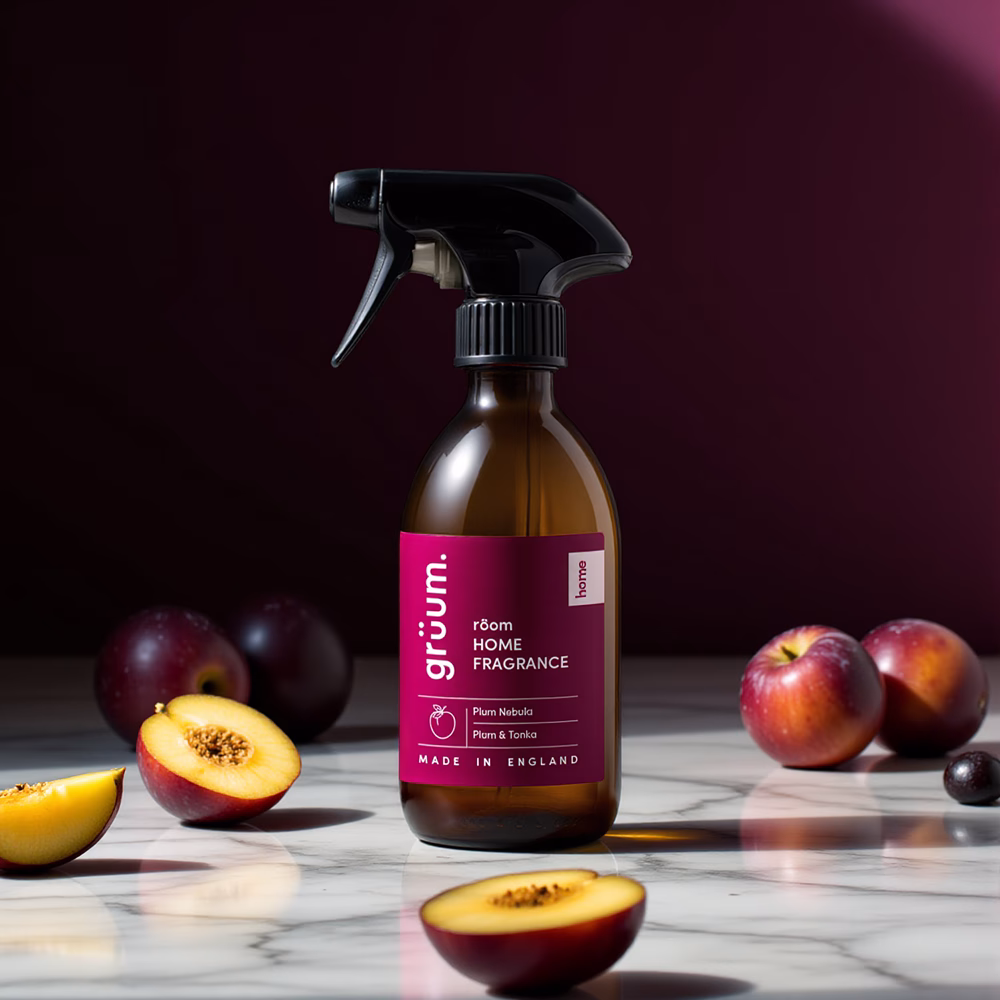 Room fragrance bottle with plums