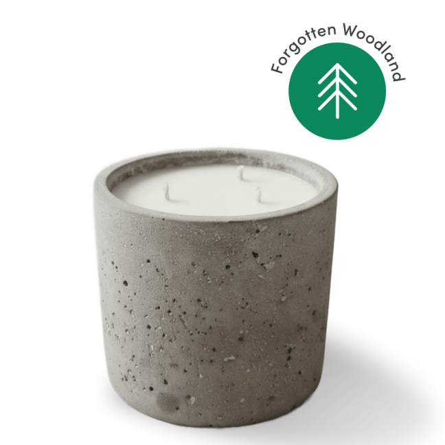 Concrete candle with three wicks.