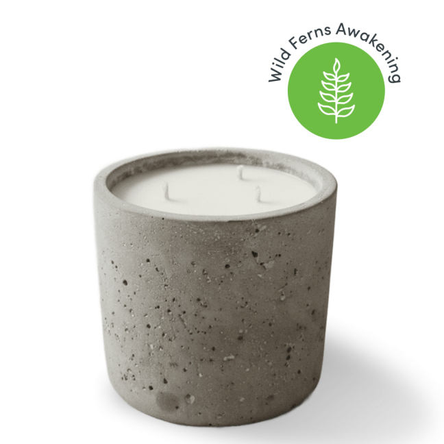 Concrete jar candle with green logo