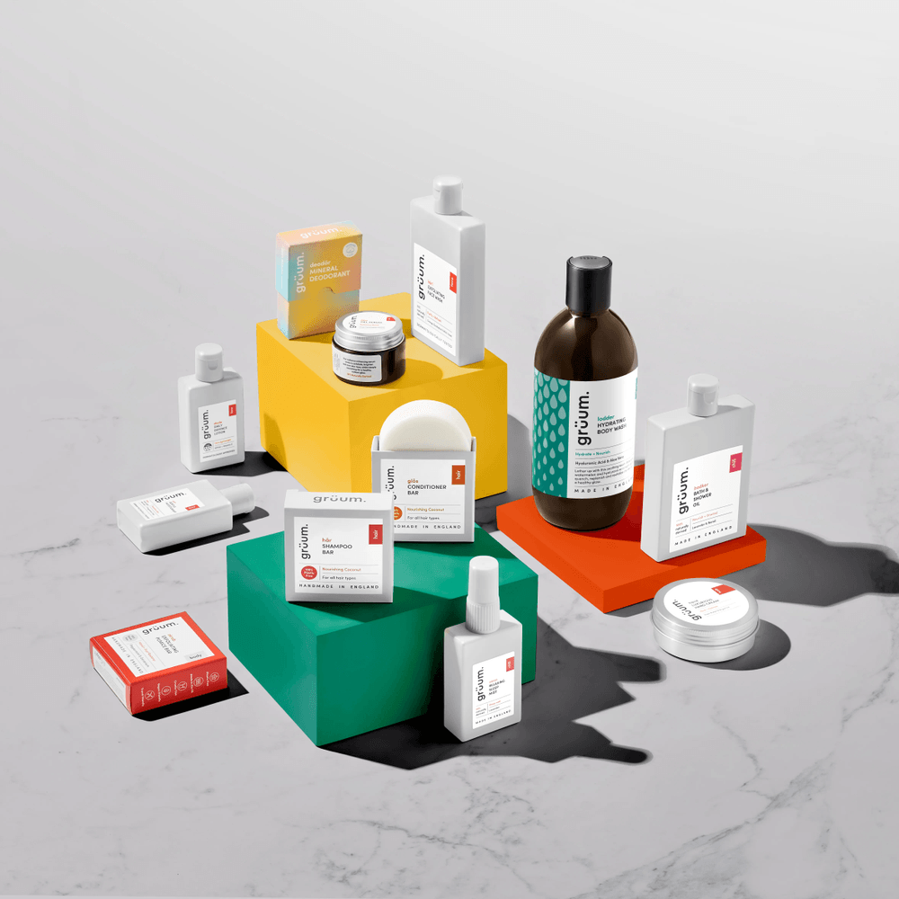 Assorted grooming products on colorful blocks.