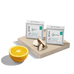 Shampoo and conditioner bars with orange and coconut.